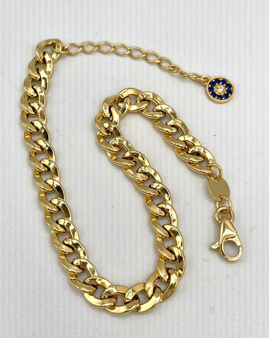 Gold chain necklace with a clasp on a white background